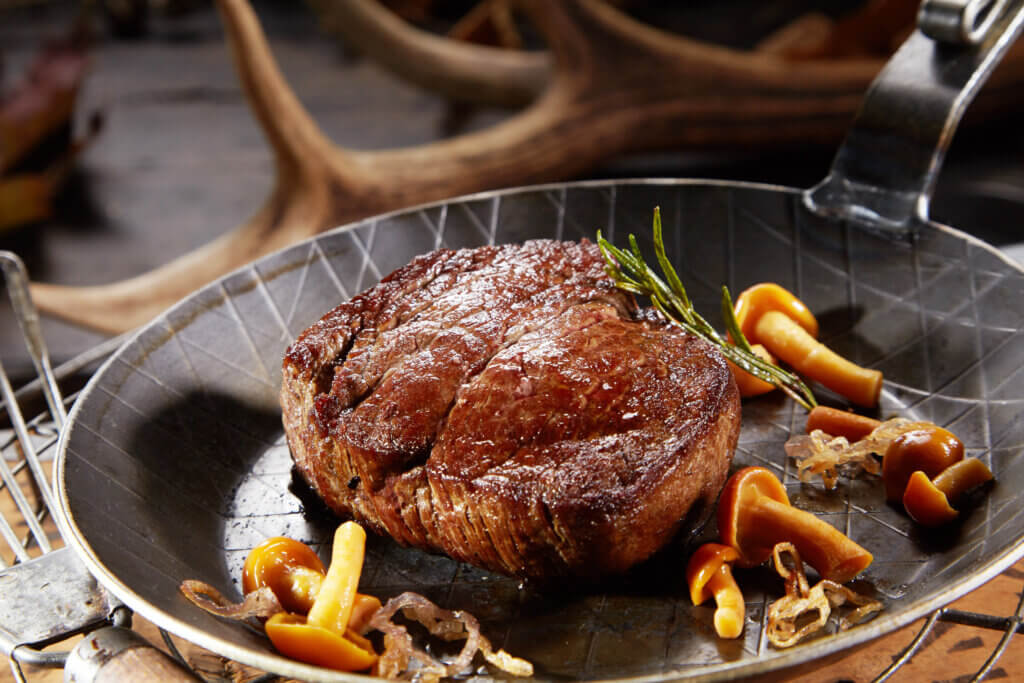 Seared wild venison deer steak is an excellent heart healthy choice for lean red meat.